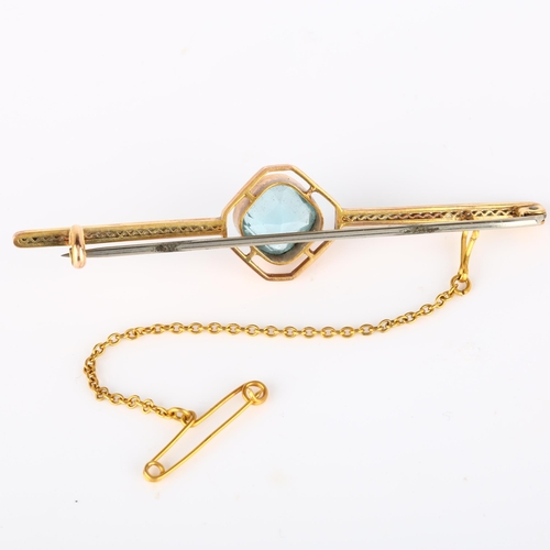 182 - An Art Deco 9ct gold blue topaz bar brooch, pierced openwork decoration, brooch length 63.6mm, 4g