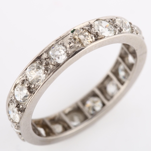 186 - An Antique diamond full eternity ring, unmarked platinum settings with old-cut diamonds, total diamo... 