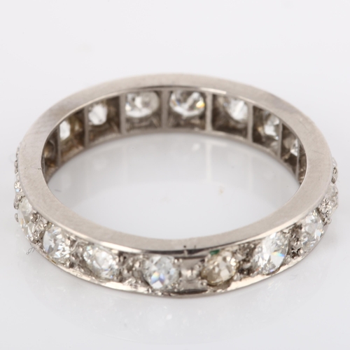 186 - An Antique diamond full eternity ring, unmarked platinum settings with old-cut diamonds, total diamo... 