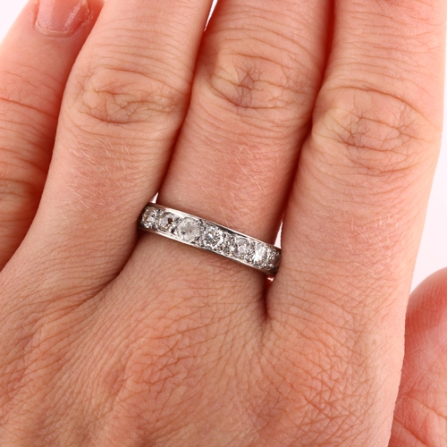 186 - An Antique diamond full eternity ring, unmarked platinum settings with old-cut diamonds, total diamo... 