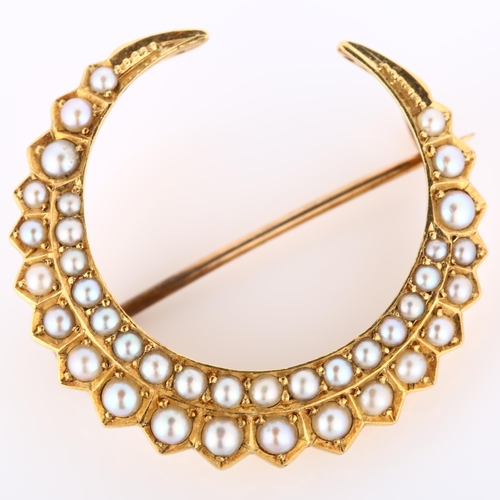 188 - A Victorian 15ct gold pearl crescent moon brooch, set with split pearls, brooch diameter 28.7mm, 5.2... 