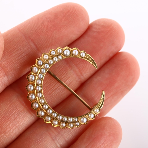 188 - A Victorian 15ct gold pearl crescent moon brooch, set with split pearls, brooch diameter 28.7mm, 5.2... 