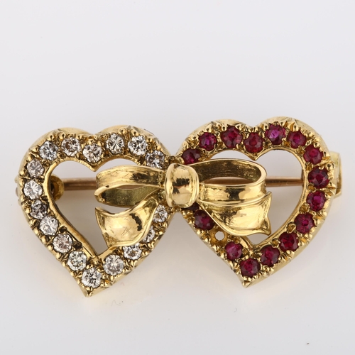 192 - A late 20th century 18ct gold ruby and diamond double-heart brooch, set with round-cut rubies and mo... 