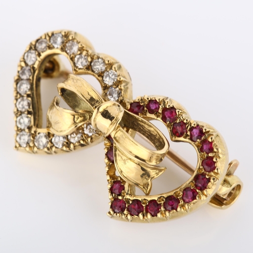 192 - A late 20th century 18ct gold ruby and diamond double-heart brooch, set with round-cut rubies and mo... 