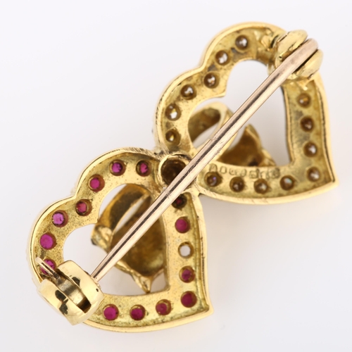 192 - A late 20th century 18ct gold ruby and diamond double-heart brooch, set with round-cut rubies and mo... 