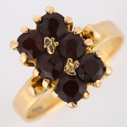 194 - An 18ct gold Bohemian garnet dress ring, set with round-cut garnets, setting height 11.8mm, size I, ... 