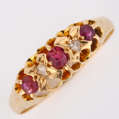 195 - An early 20th century 18ct gold graduated five stone ruby and diamond half hoop ring, maker's marks ... 