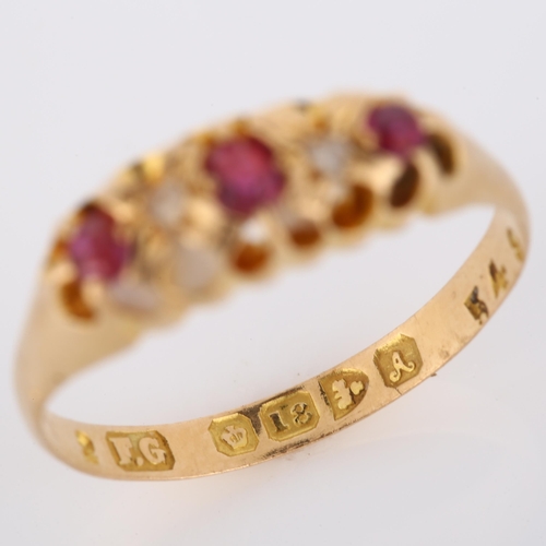 195 - An early 20th century 18ct gold graduated five stone ruby and diamond half hoop ring, maker's marks ... 