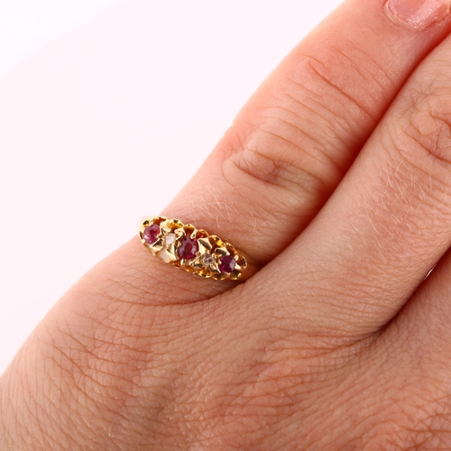 195 - An early 20th century 18ct gold graduated five stone ruby and diamond half hoop ring, maker's marks ... 