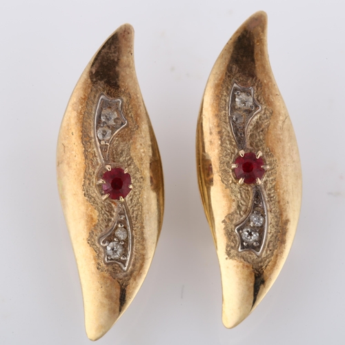 197 - A pair of 9ct gold garnet and diamond earrings, polished feather design with clip and post fittings,... 