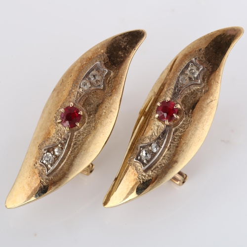 197 - A pair of 9ct gold garnet and diamond earrings, polished feather design with clip and post fittings,... 