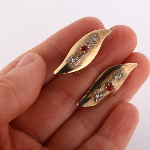 197 - A pair of 9ct gold garnet and diamond earrings, polished feather design with clip and post fittings,... 