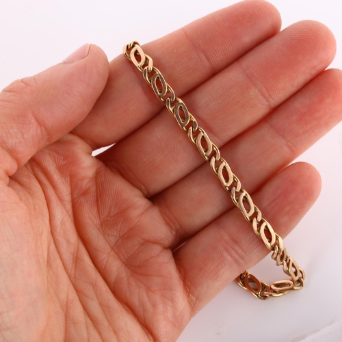 198 - A Continental 14ct rose gold fancy flat link chain bracelet, length 21cm, 10.3g