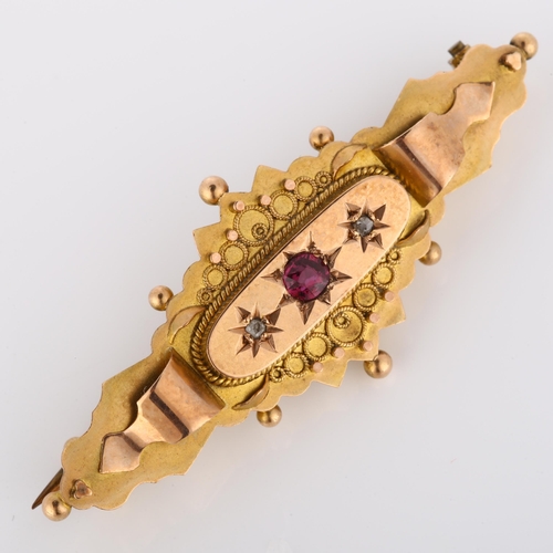 200 - An early 20th century 9ct rose gold Etruscan Revival brooch, set with round-cut ruby and rose-cut di... 