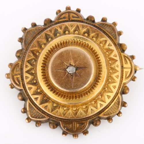 201 - A Victorian diamond Etruscan Revival mourning brooch, unmarked yellow metal settings with glass-cove... 