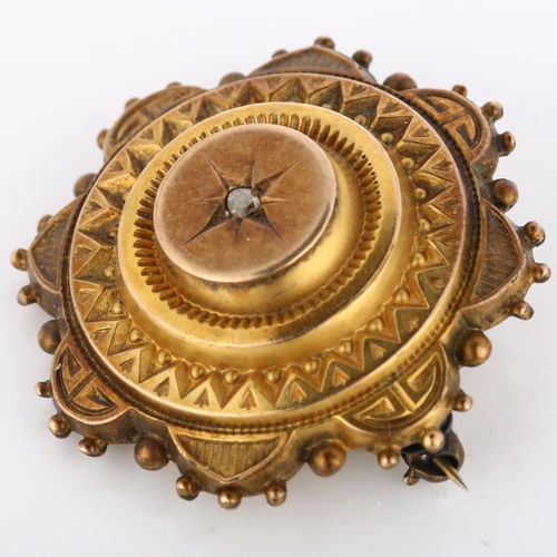 201 - A Victorian diamond Etruscan Revival mourning brooch, unmarked yellow metal settings with glass-cove... 