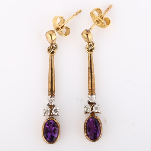 204 - A pair of amethyst and diamond pendant earrings, unmarked gold settings with ovalmixed-cut amethyst ... 