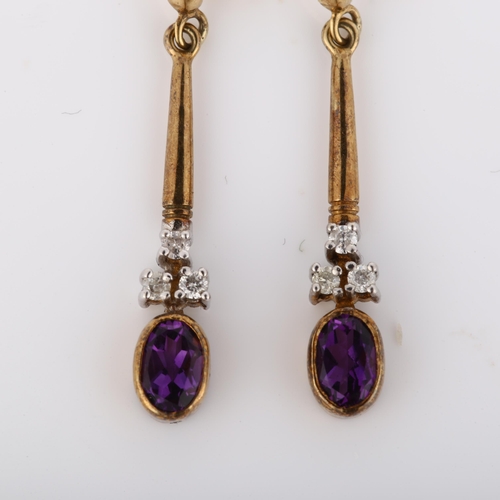 204 - A pair of amethyst and diamond pendant earrings, unmarked gold settings with ovalmixed-cut amethyst ... 