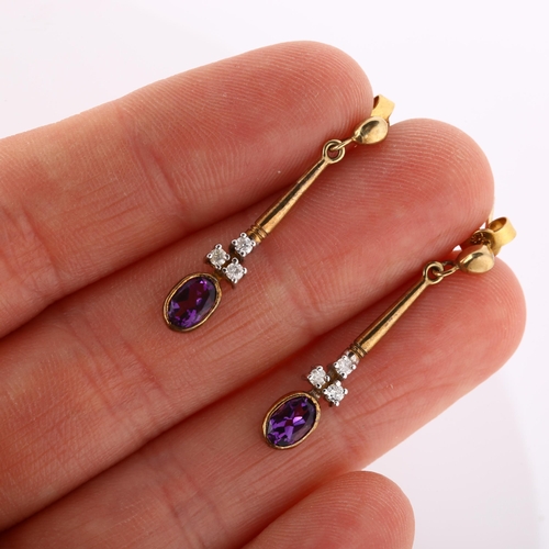 204 - A pair of amethyst and diamond pendant earrings, unmarked gold settings with ovalmixed-cut amethyst ... 