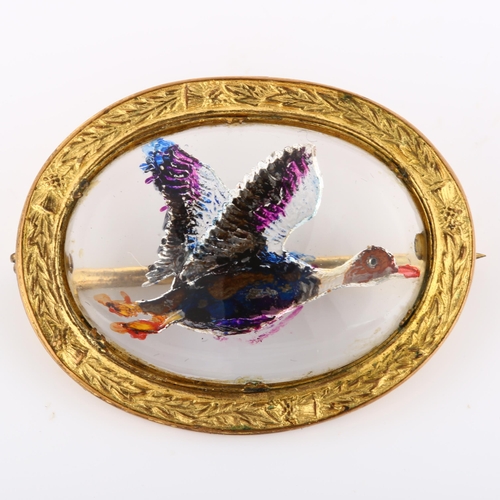 205 - An Essex Crystal style mallard brooch, relief moulded and painted, in gilt-metal frame inscribed Miz... 