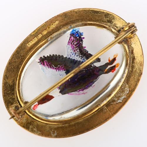 205 - An Essex Crystal style mallard brooch, relief moulded and painted, in gilt-metal frame inscribed Miz... 