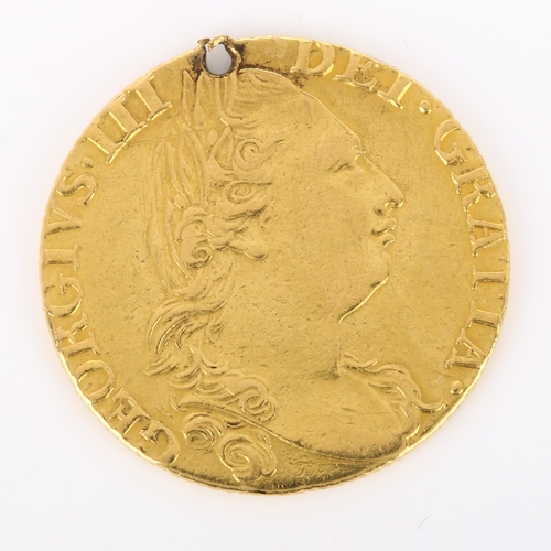 215 - A George III 1782 gold guinea coin, 8.2g