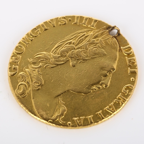 215 - A George III 1782 gold guinea coin, 8.2g