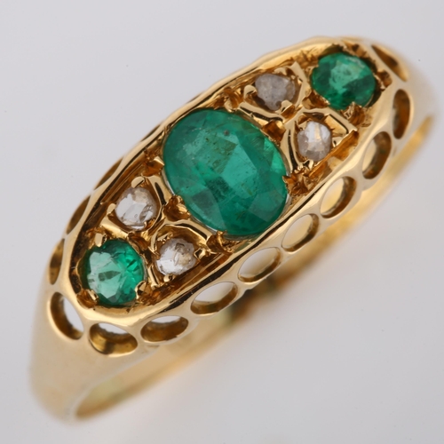 221 - An early 20th century 18ct gold emerald and diamond half hoop ring, indistinct hallmarks, setting he... 