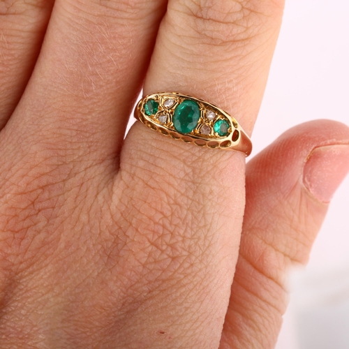 221 - An early 20th century 18ct gold emerald and diamond half hoop ring, indistinct hallmarks, setting he... 