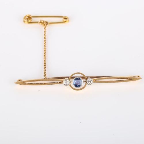 222 - An Art Deco 15ct gold three stone sapphire and diamond bar brooch, brooch length 53.6mm, 3.2g