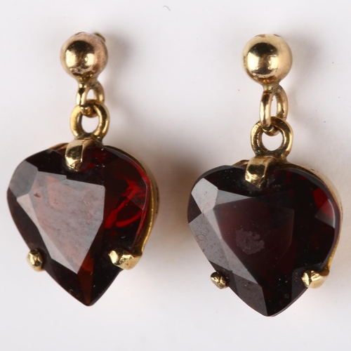 223 - A pair of mid-20th century 9ct gold garnet heart earrings, set with heart-cut garnets and stud fitti... 