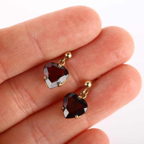 223 - A pair of mid-20th century 9ct gold garnet heart earrings, set with heart-cut garnets and stud fitti... 