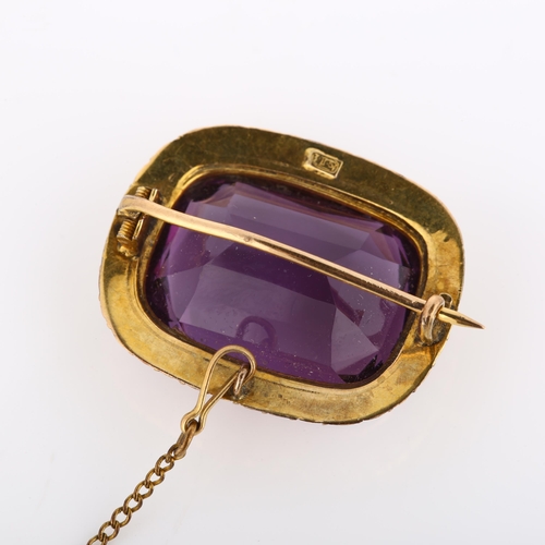 233 - A Victorian 9ct gold amethyst and pearl cluster brooch, set with large cushion-cut amethyst and spli... 