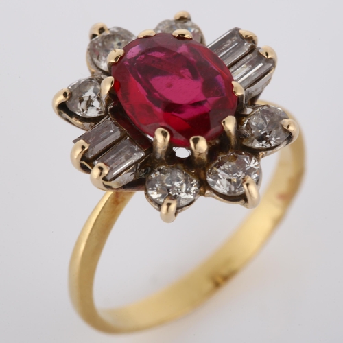 245 - A late 20th century synthetic ruby and diamond cluster ring, unmarked gold settings with oval mixed-... 