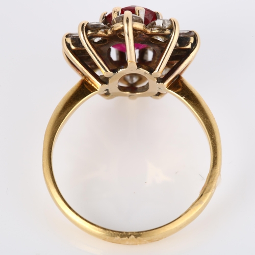 245 - A late 20th century synthetic ruby and diamond cluster ring, unmarked gold settings with oval mixed-... 