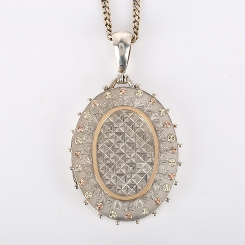 247 - A Victorian photo locket pendant necklace, unmarked silver settings with applied two-colour gold flo... 