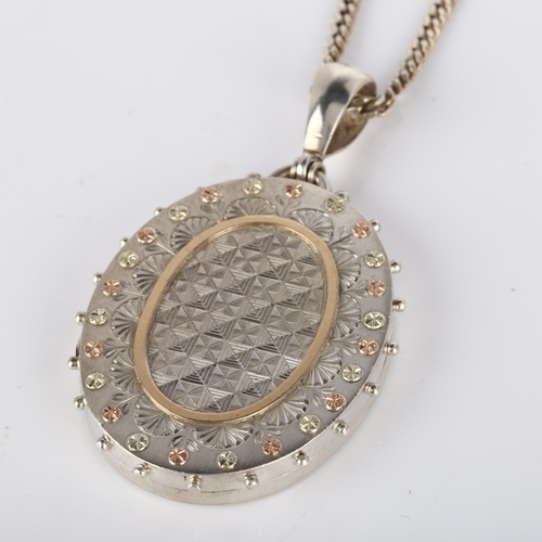 247 - A Victorian photo locket pendant necklace, unmarked silver settings with applied two-colour gold flo... 