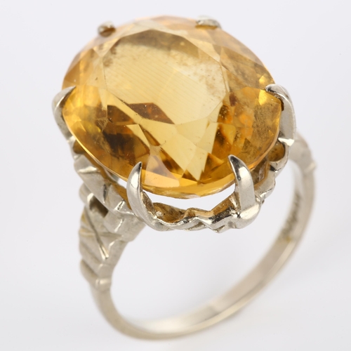 251 - An American 9ct white gold citrine dress ring, by Birks, setting height 19.7mm, size L, 6.7g