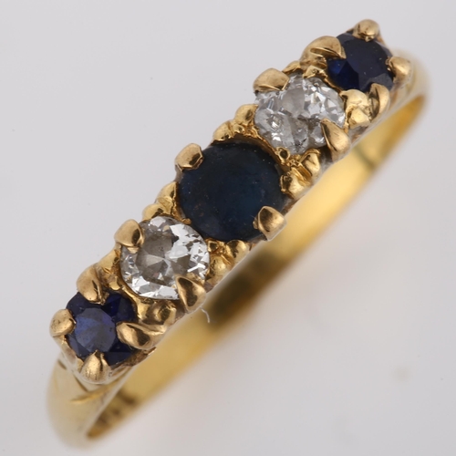 257 - An early/mid-20th century 18ct gold graduated five stone sapphire and diamond half hoop ring, settin... 