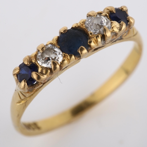 257 - An early/mid-20th century 18ct gold graduated five stone sapphire and diamond half hoop ring, settin... 