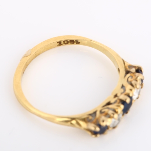 257 - An early/mid-20th century 18ct gold graduated five stone sapphire and diamond half hoop ring, settin... 