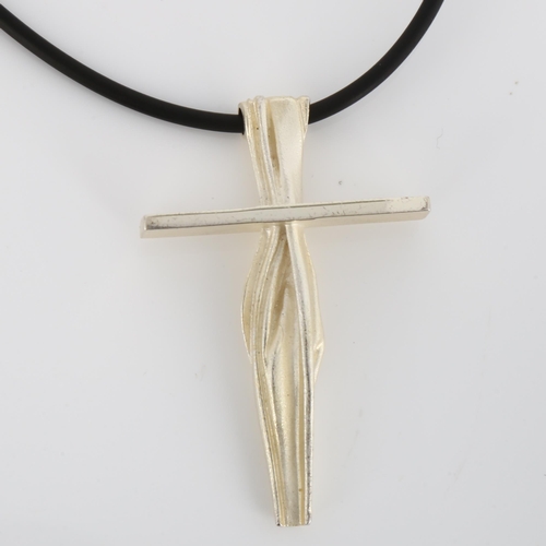 265 - LAPPONIA - a Finnish sterling silver cross pendant necklace, on black rubber cord, date hallmark 200... 