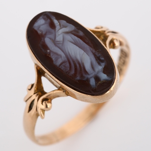 268 - An early 20th century 9ct rose gold hardstone cameo ring, relief carved panel depicting female with ... 