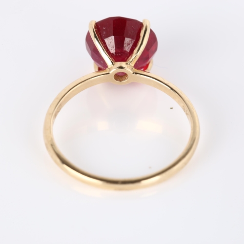 273 - A modern 9ct gold synthetic ruby dress ring, set with modern round brilliant-cut ruby, diameter 15.1... 