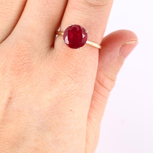 273 - A modern 9ct gold synthetic ruby dress ring, set with modern round brilliant-cut ruby, diameter 15.1... 