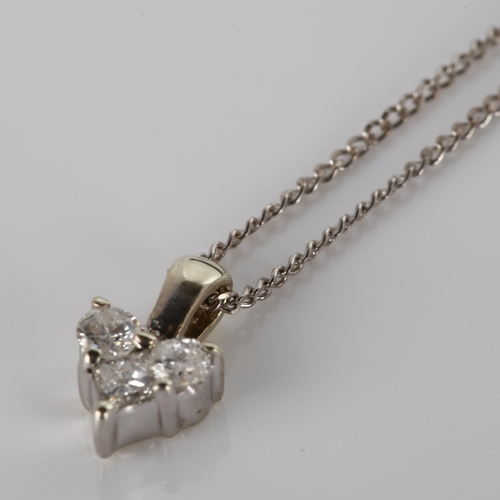 280 - A modern 9ct white gold diamond spade pendant necklace, on 9ct fine curb link chain, total diamond c... 