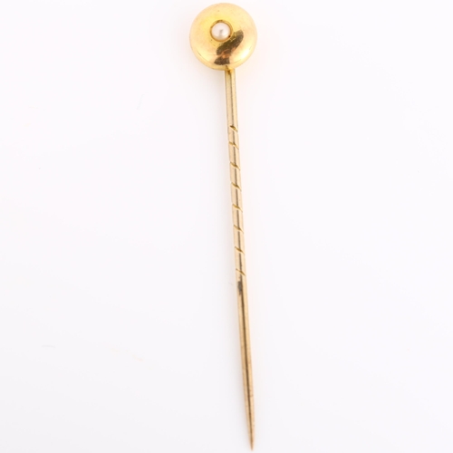 286 - A Victorian 15ct gold split pearl stickpin, head diameter 8mm, overall length 53.4mm, 1.1g