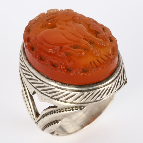 294 - A large Eastern silver carnelian Sagittarius cameo ring, setting height 33.2mm, size Z+, 27.1g