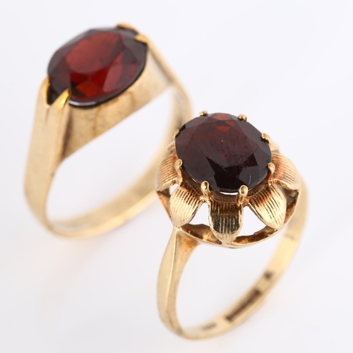 296 - 2 x 9ct gold garnet rings, sizes O and P, 7.3g total (2)