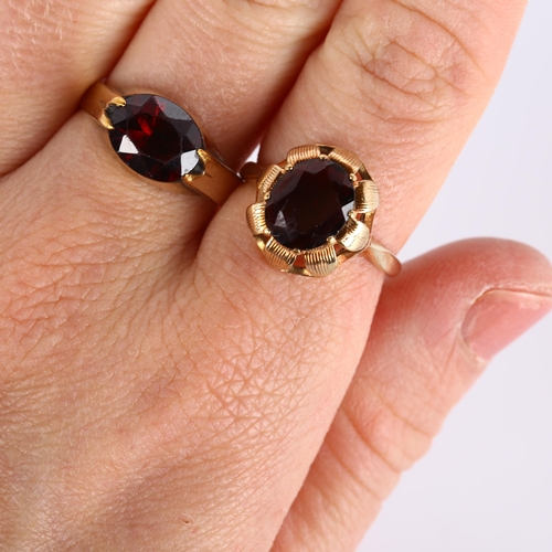 296 - 2 x 9ct gold garnet rings, sizes O and P, 7.3g total (2)